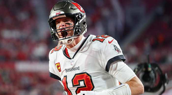 Jan 16, 2023; Tampa, Florida, USA; Tampa Bay Buccaneers quarterback Tom Brady (12) takes the field before a wild card game against the Dallas Cowboys at Raymond James Stadium.